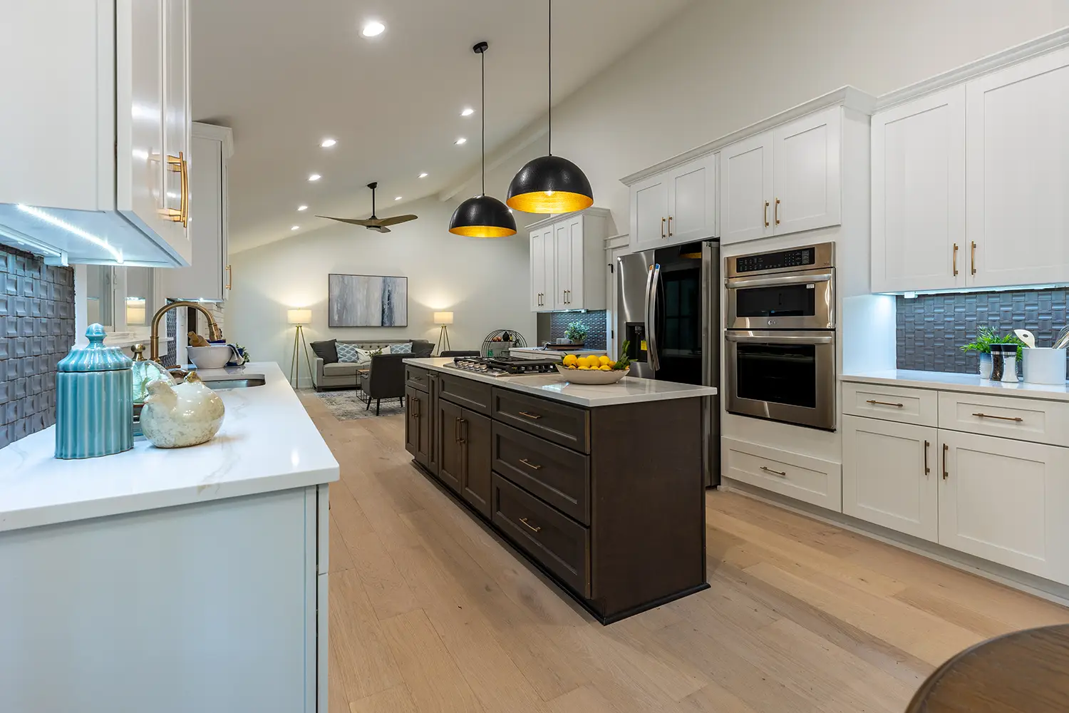 Modern, minimalist kitchen design featuring sleek white cabinets, with a clean and harmonious layout.